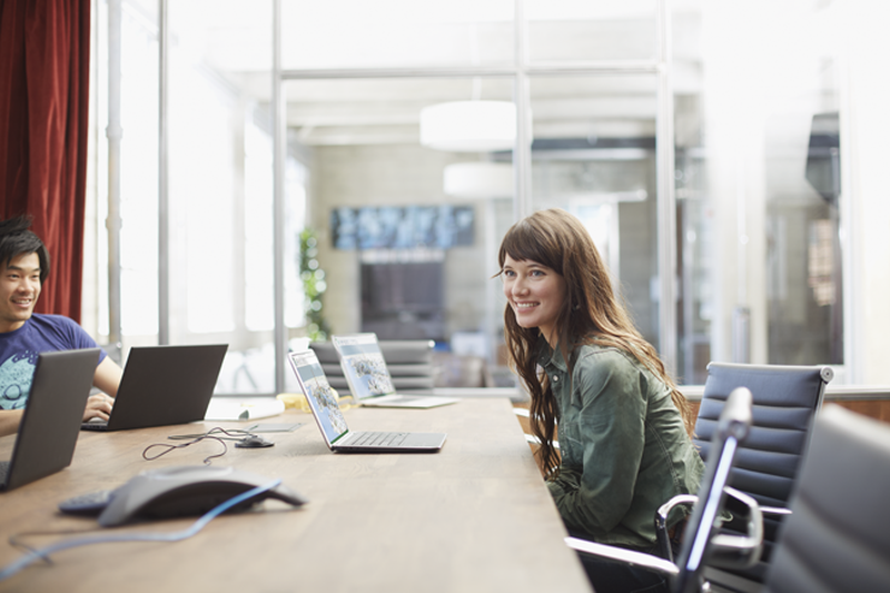 Photo of employees in conference room