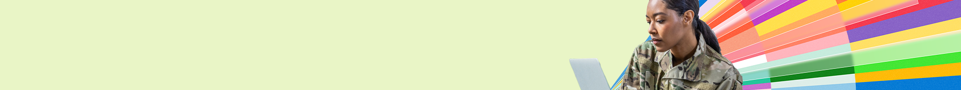 Photo of Microsoft employees in front of bullding sign