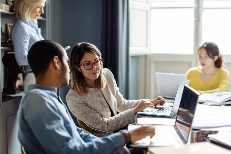 Photo of Microsoft employee and contractor working