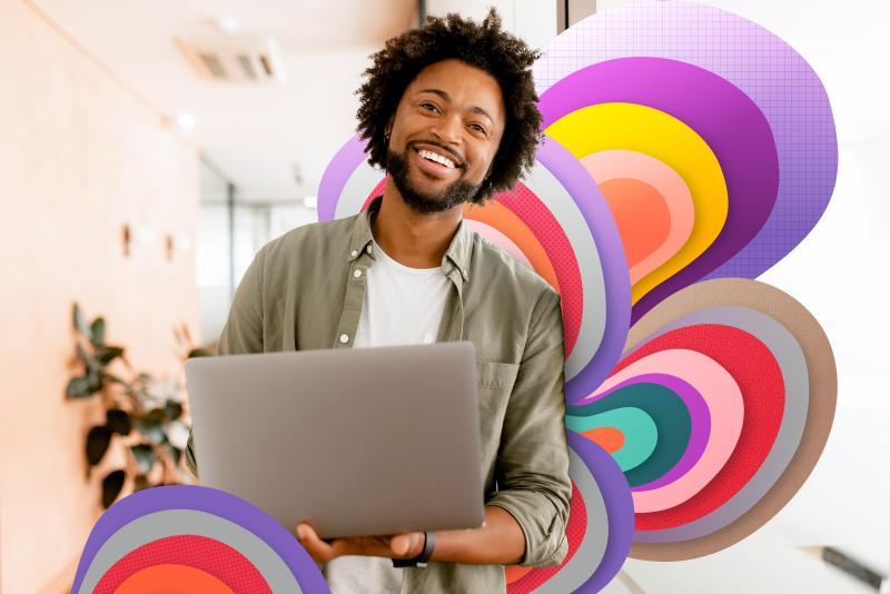 photo of employee with laptop and colorful background