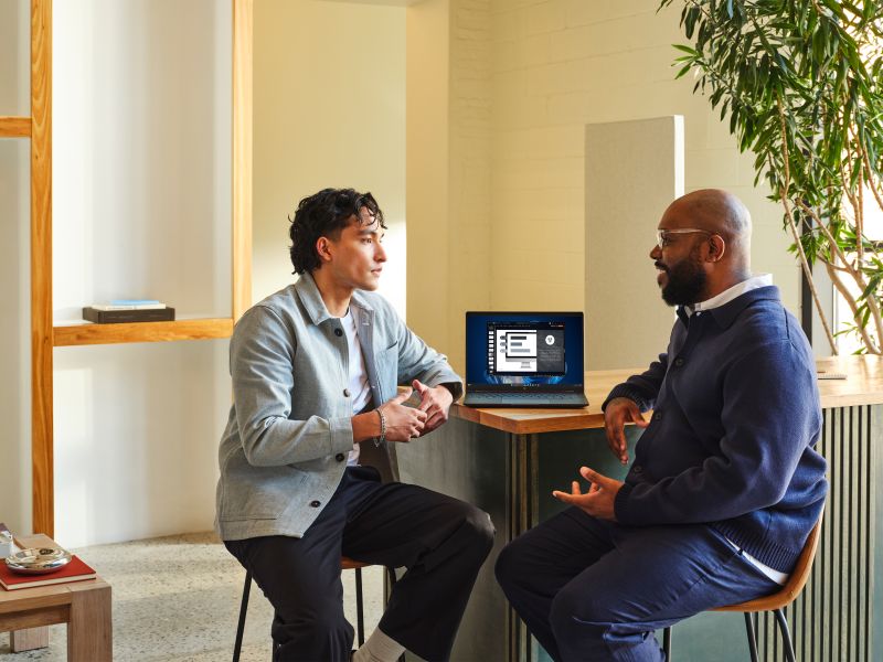 Employees in discussion. 