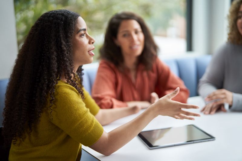 Photo of employees in meeting