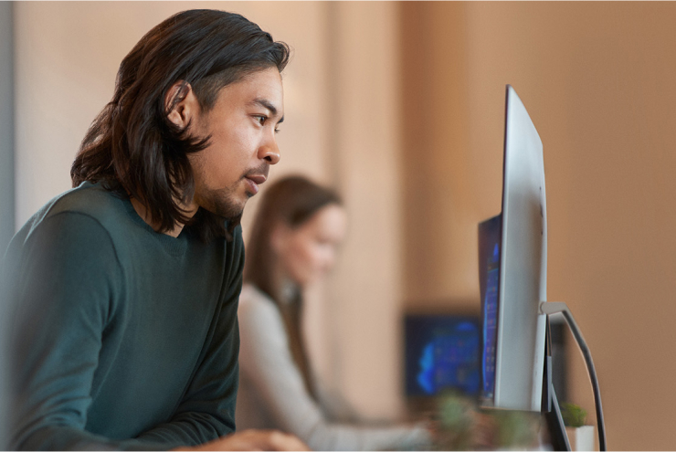 image of Microsoft employees working on computers